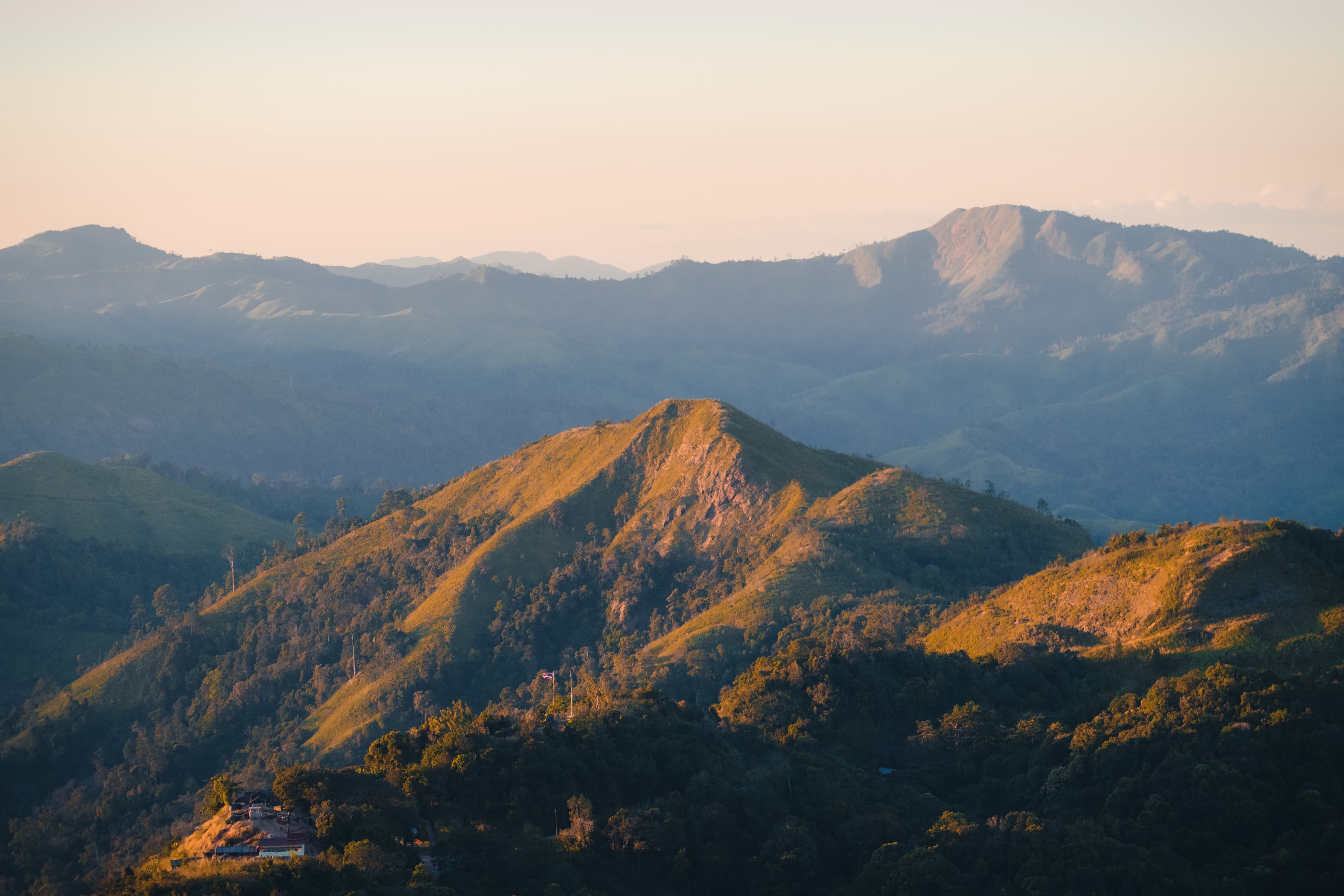 Sunlit hills of Thong Pha Phum